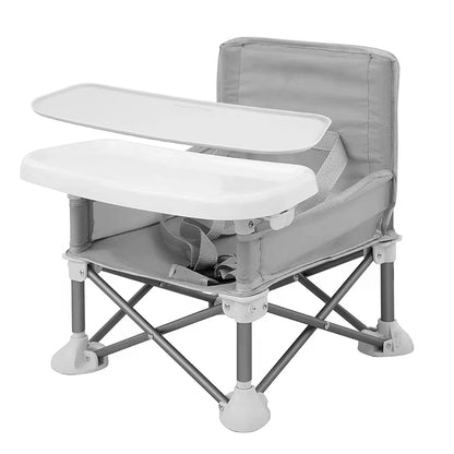 "Silla de bebé lista para la aventura: compacta, portátil y elegante para acampar, la playa y el jardín."